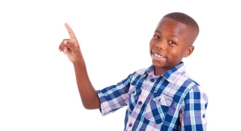Students track their breathing as they trace up and down the fingers of one hand.